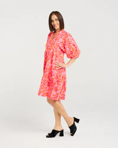 Model wearing Abstract Blush Eileen Dress By Seduce Available at Beetees Nelson